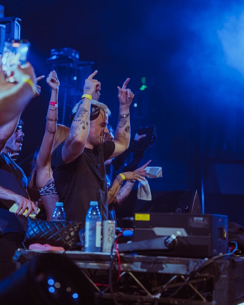 CHVPMAN, hands up in the booth
